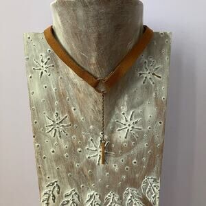 Brown o-ring choker with chain and slim gold pendant